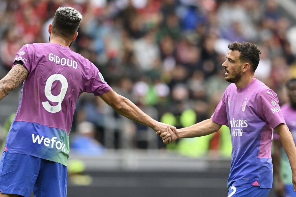 Giroud e Florenzi si danno la mano